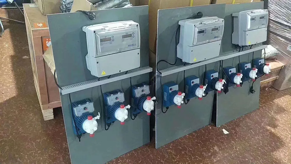 Three compact panel-mounted controller and metering pump assemblies